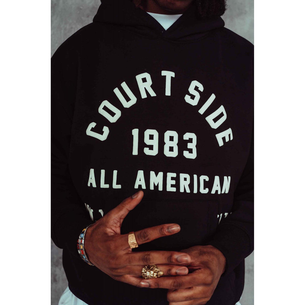 Courtside | 1983 All American Oversized Relaxed Fit Enlarge Print Overhead Hood Top - Black