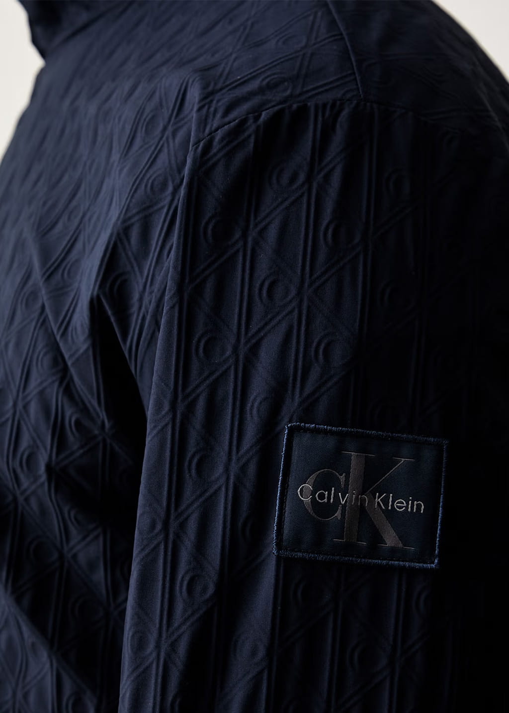 Calvin Klein Jeans | LV04RG512G Repeat Logo Lightweight Windbreaker Funnel Neck Jacket - Dark Navy