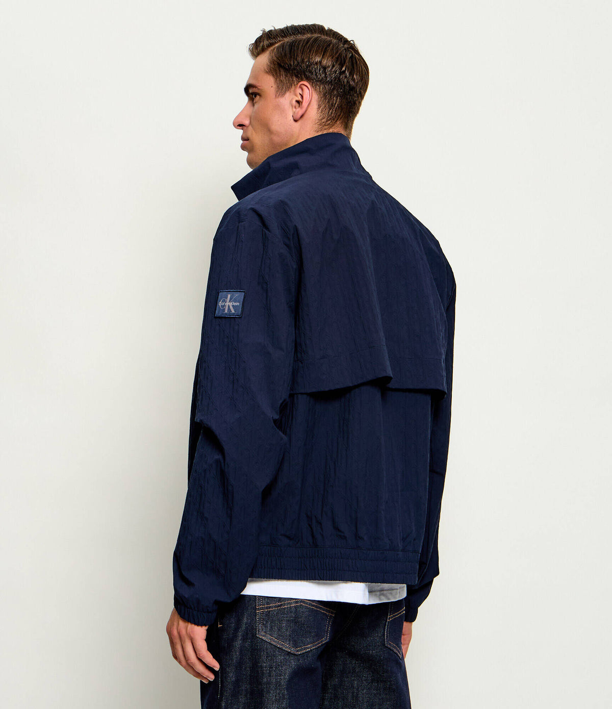 Calvin Klein Jeans | LV04RG512G Repeat Logo Lightweight Windbreaker Funnel Neck Jacket - Dark Navy